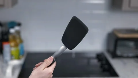 Kitchen Utensils with Stovetop as backdrop Stock Footage 120662290