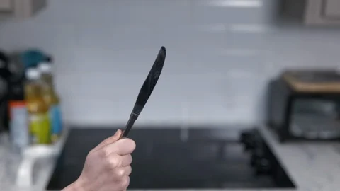 Kitchen Utensils with Stovetop as backdrop Stock Footage 120662602