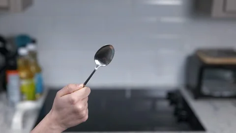 Kitchen Utensils with Stovetop as backdrop Stock Footage 120662754