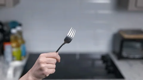 Kitchen Utensils with Stovetop as backdrop Stock Footage 120662954