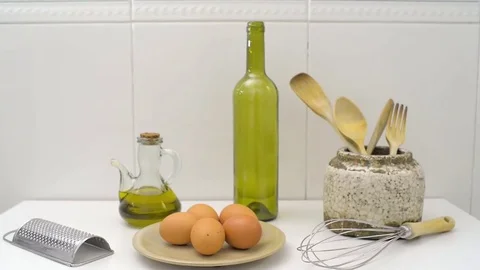 Kitchen utensils on white table. Dolly shot Stock Footage 73899883
