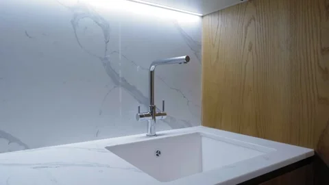 Kitchen video with marble countertop, chrome faucet 스톡 동영상 321950865