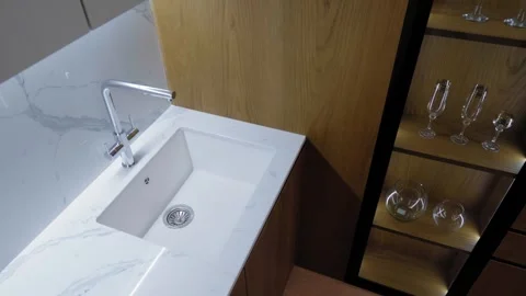Kitchen video with marble countertop, chrome faucet 스톡 동영상 321950919