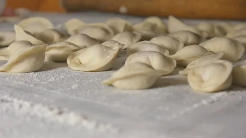 In the kitchen we make dumplings, hand-made flour and meat Video stock 111911805