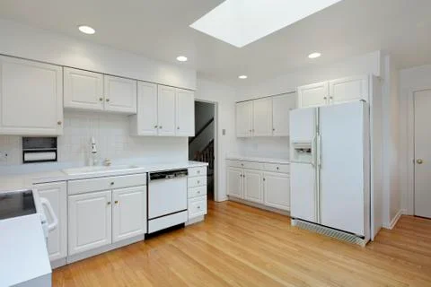 Kitchen with white cabinetry Stock Photos