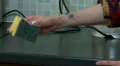 Kitchen work surface being wiped with sponge HD Footage