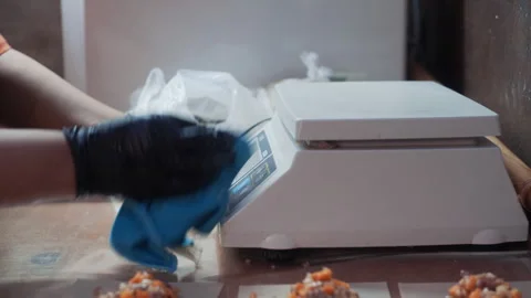 Kitchen Worker Cleaning Digital Scales Stock-Footage 323095456