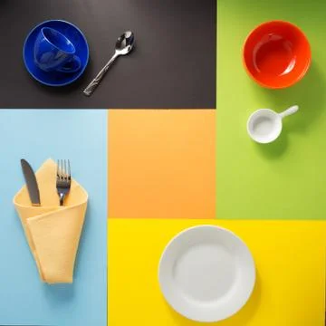 Kitchenware at colorful background Stock Photos