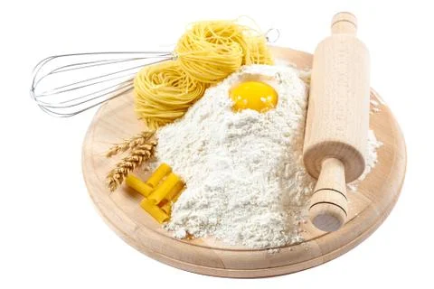 Kitchenware, flour and egg on white background. Stock Photos