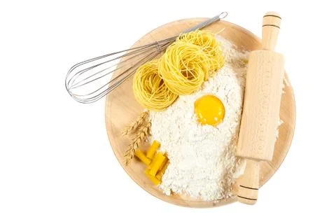 Kitchenware, flour and egg on white background. Stock Photos