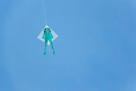 Kite on blue sky Stock Photos
