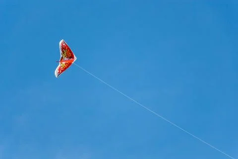 Kite on blue sky Stock Photos