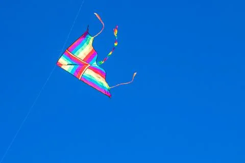 Kite in the blue sky Stock Photos