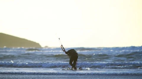 Kite boarder on the beach at sunset. Stock Footage 88373578
