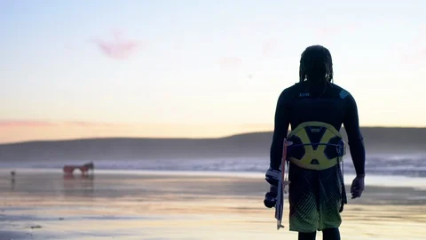 Kite boarder on the beach at sunset. Stock-Footage 88373623