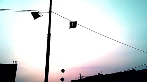 A kite caught in an electric cable. Stock Footage 262080584