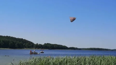 Kite- flag over the lake Stock Footage 166976558
