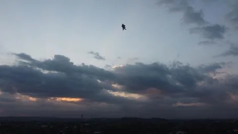 The kite flew high when the sky was cloudy Stock Photos