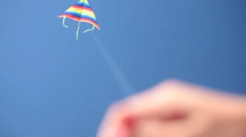 Kite flying against clear blue sky. Stock-Footage 30383360