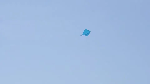 A kite flying in the blue sky Stockbeeldmateriaal 134379751