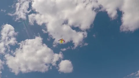 A kite flying in the clouds. Stock Footage 83861263