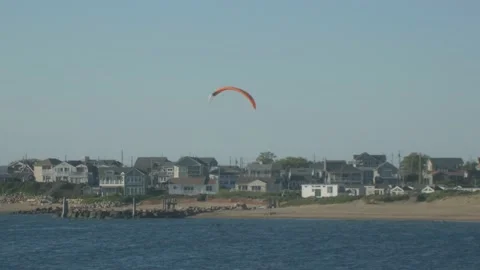 Kite Flying by the Ocean Rocks Waves Stock Footage 169061871