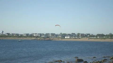 Kite Flying by the Ocean Rocks Waves Stock Footage 169062429