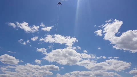 Kite flying in the sky among the clouds. Stock Footage 255877970