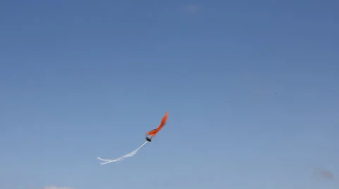 Kite flying under blue sky 8962 Stock Footage 26620136
