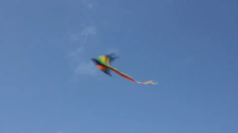 Kite flying under blue sky 8955 Stock Footage 26620296