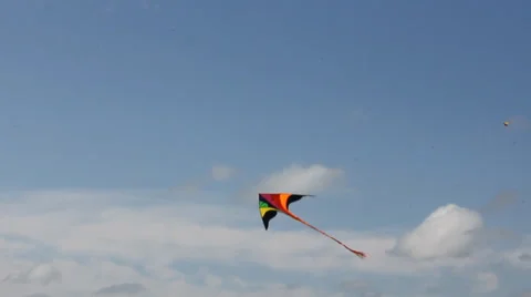 Kite flying under blue sky 8951 Stock Footage 26620341