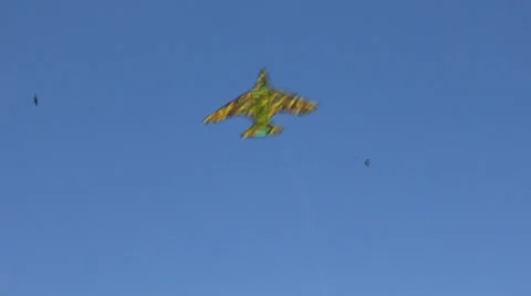 Kite flying under blue sky 8943 Stock Footage 26620401