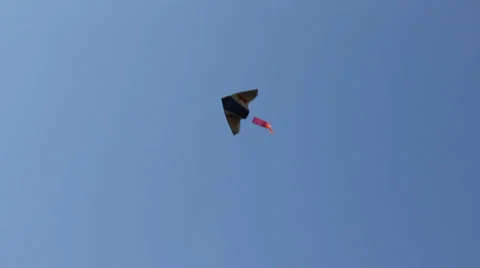 Kite flying under blue sky 8940 스톡 동영상 26620413