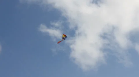 Kite flying under blue sky 8936_01 Stock Footage 26620434