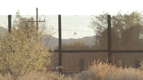 Kite Flying at U.S. Mexico border Stock Footage 83342377