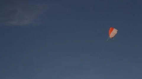 Kite soaring in the blue sky Stock Footage 62984234