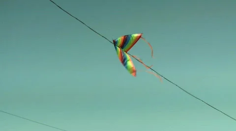 A kite stuck on an electric wire Stock Footage 471476