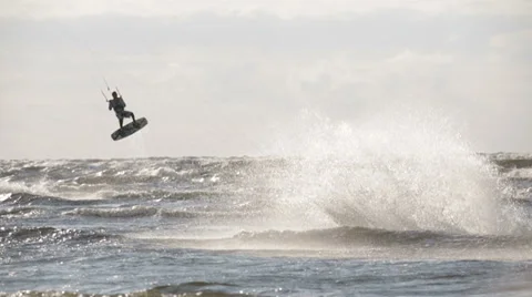 Kite Surfer falling down into the Water, 50 FPS Slow Motion Stock Footage 36034849
