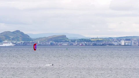 Kite surfer on the Firth of Forth with the City of Edinburgh at the background. Stock Footage 71101668