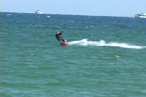 Kite Surfer making a jump Stock Footage 75323