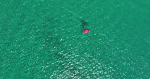 Kite surfer moving through the water off the Island of Paros in Greece. Stock Footage 233317469