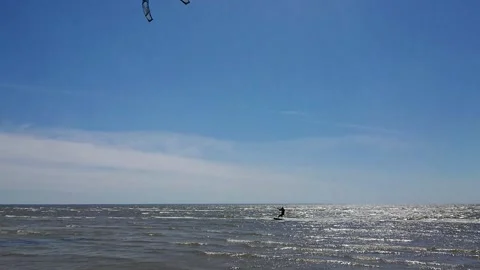Kite surfer riding the waves Stock Footage 143903615