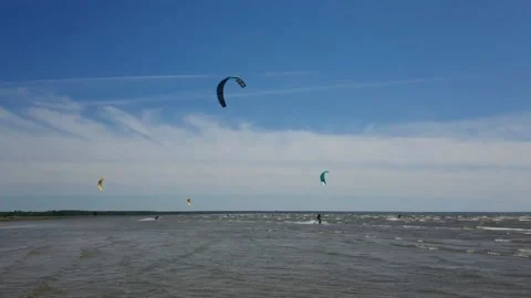 Kite surfer riding the waves Stock Footage 143903701