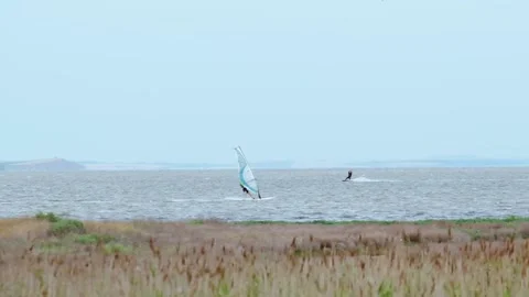 Kite surfer in the sea Stock Footage 140233259