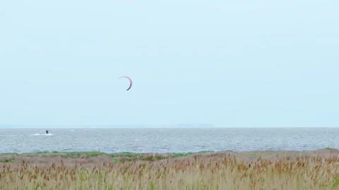 Kite surfer in the sea Stock Footage 140233319