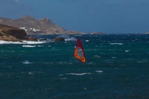 Kite surfing on blue waves Stock Photos