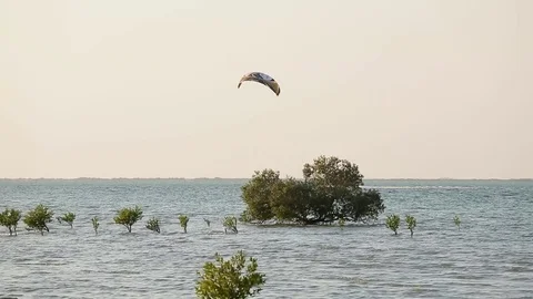 Kite surfing at sunset Stock Footage 70141888