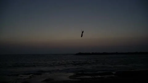 Kite surfing at sunset Stock Footage 138281942