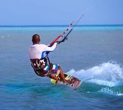 Kite surfing in waves Stock Photos