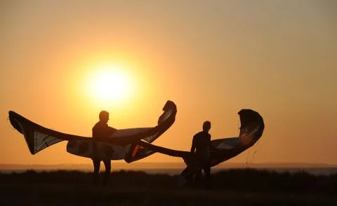 Kite surfing while sunset 스톡 사진